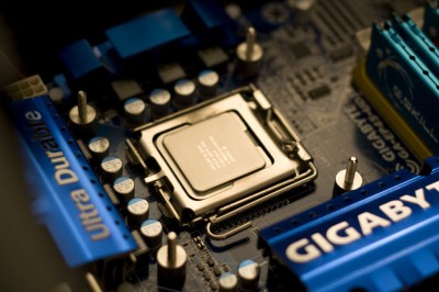 IMG_2016 A closeup of the CPU installed, the screws holding the backplate installed.